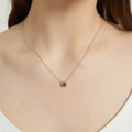 Model wearing Solitaire Kaleidoscope Bezel CZ Necklace in Sterling Silver 0.8ct, Red Orange Color