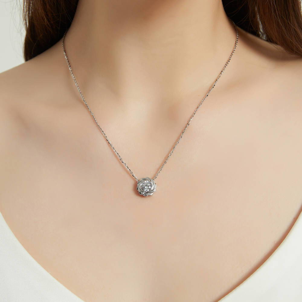 Model wearing Woven Solitaire Bezel Set CZ Pendant Necklace in Sterling Silver, 2 of 6