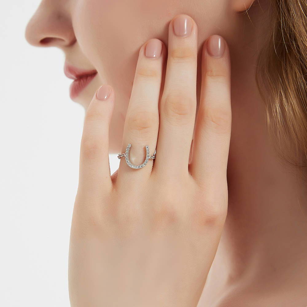 Model wearing Horseshoe CZ Chain Ring in Sterling Silver, 2 of 7