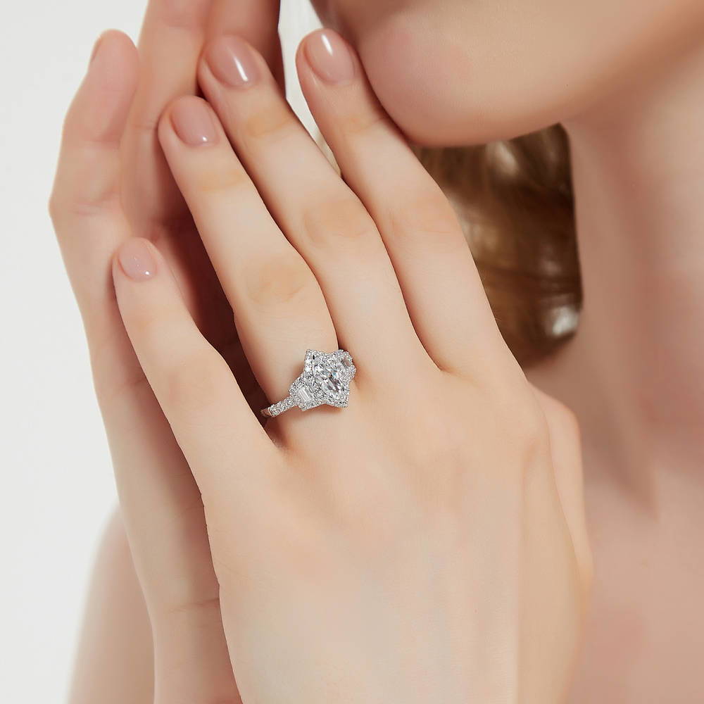 Model wearing 3-Stone Halo Art Deco 1ct Marquise CZ Ring in Sterling Silver, 3 of 10