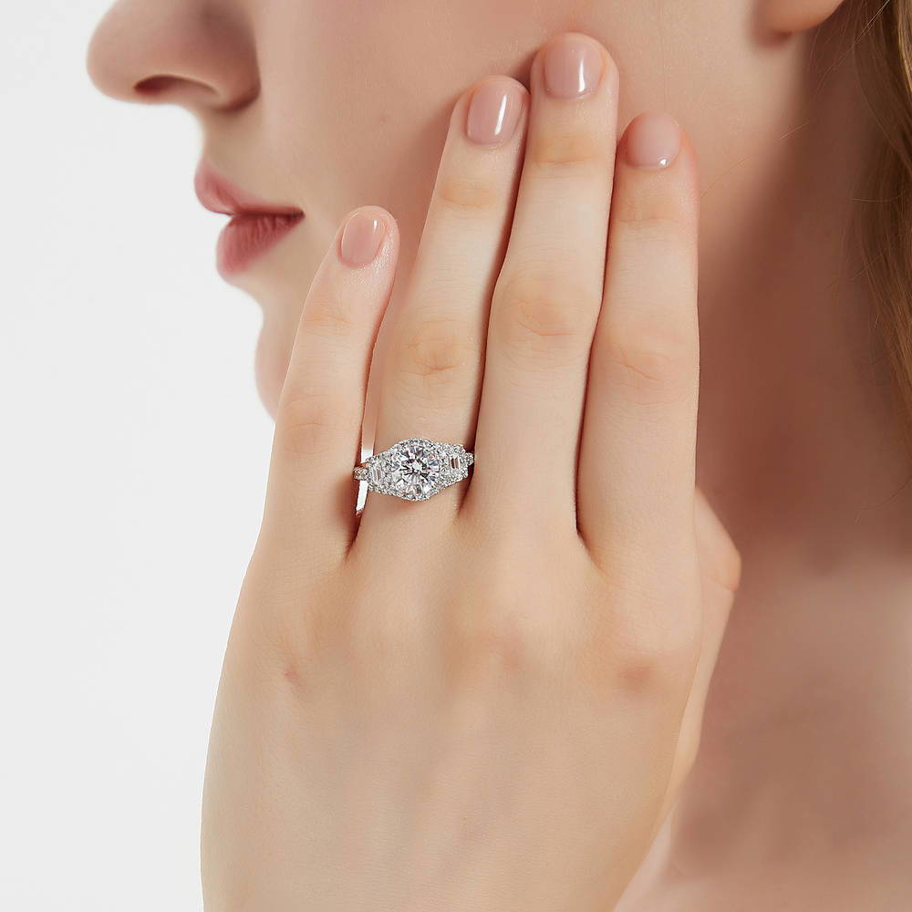 Model wearing 3-Stone Halo Art Deco 1.6ct CZ Ring in Sterling Silver, 2 of 10
