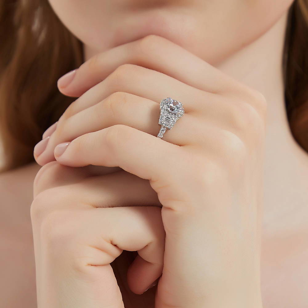 Model wearing 3-Stone Halo Art Deco 1.6ct CZ Ring in Sterling Silver, 6 of 10