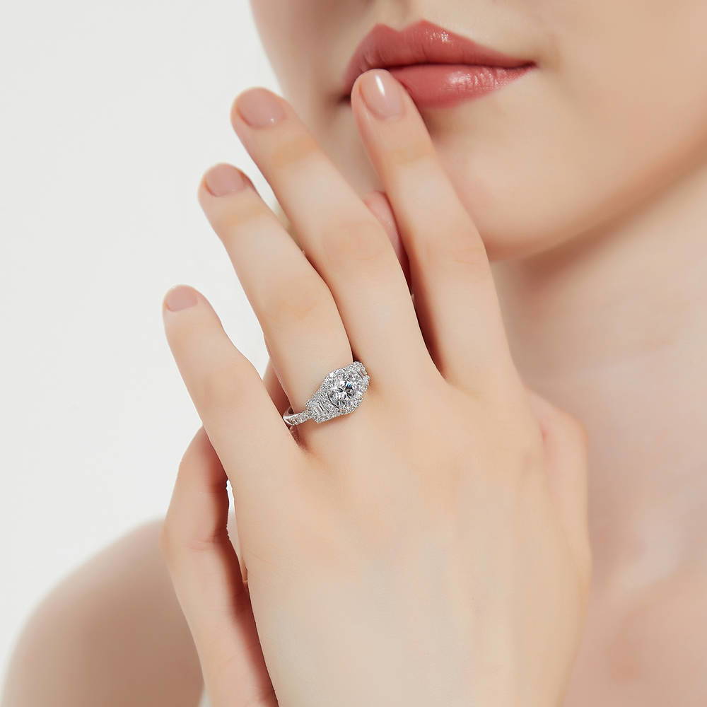 Model wearing 3-Stone Halo Art Deco 1.6ct CZ Ring in Sterling Silver, 3 of 10
