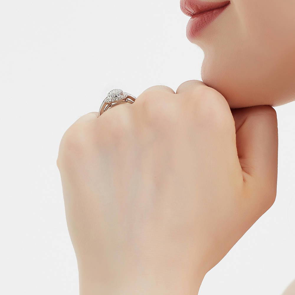 Model wearing Halo Milgrain Pear CZ Ring in Sterling Silver, 7 of 8