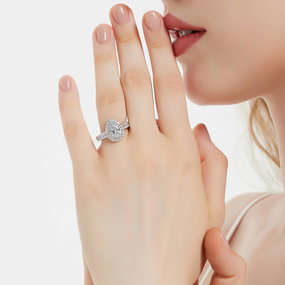 Model wearing Halo Milgrain Pear CZ Ring in Sterling Silver, 2 of 8