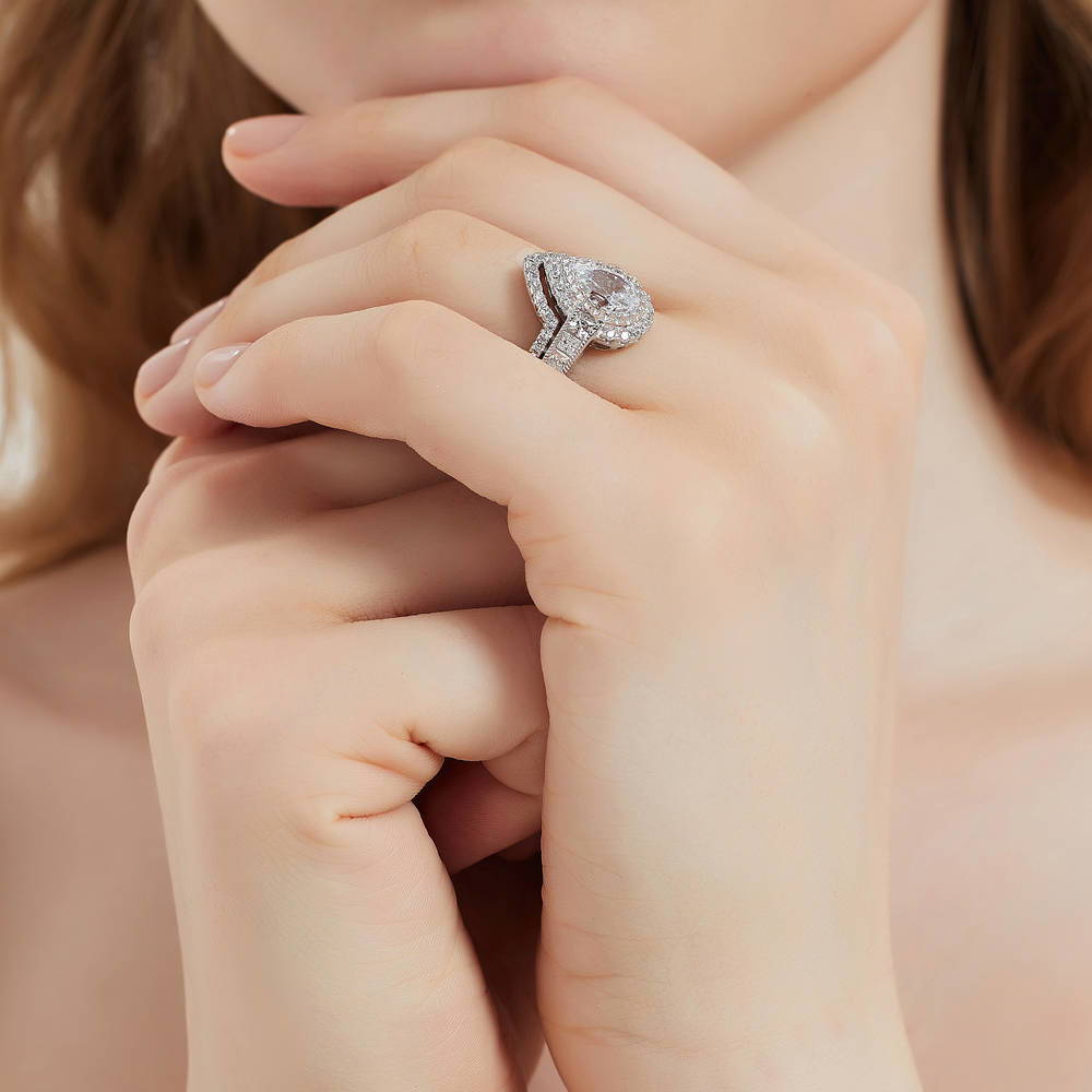 Model wearing Halo Milgrain Pear CZ Ring in Sterling Silver, 15 of 18