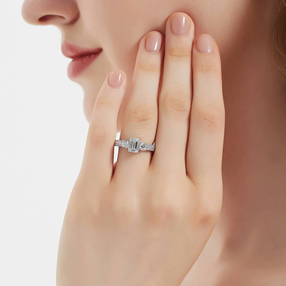 Model wearing 3-Stone 1ct Emerald Cut CZ Ring in Sterling Silver, 2 of 8