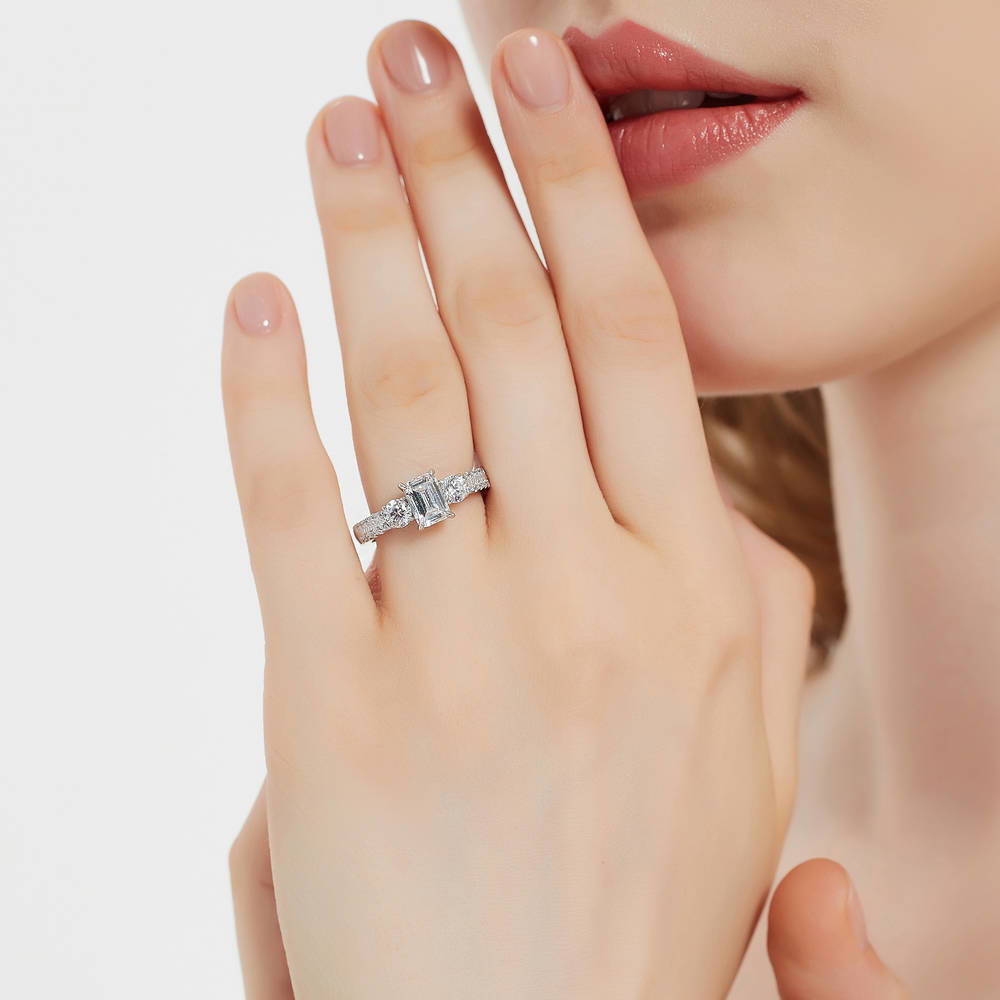 Model wearing 3-Stone 1ct Emerald Cut CZ Ring in Sterling Silver, 3 of 8