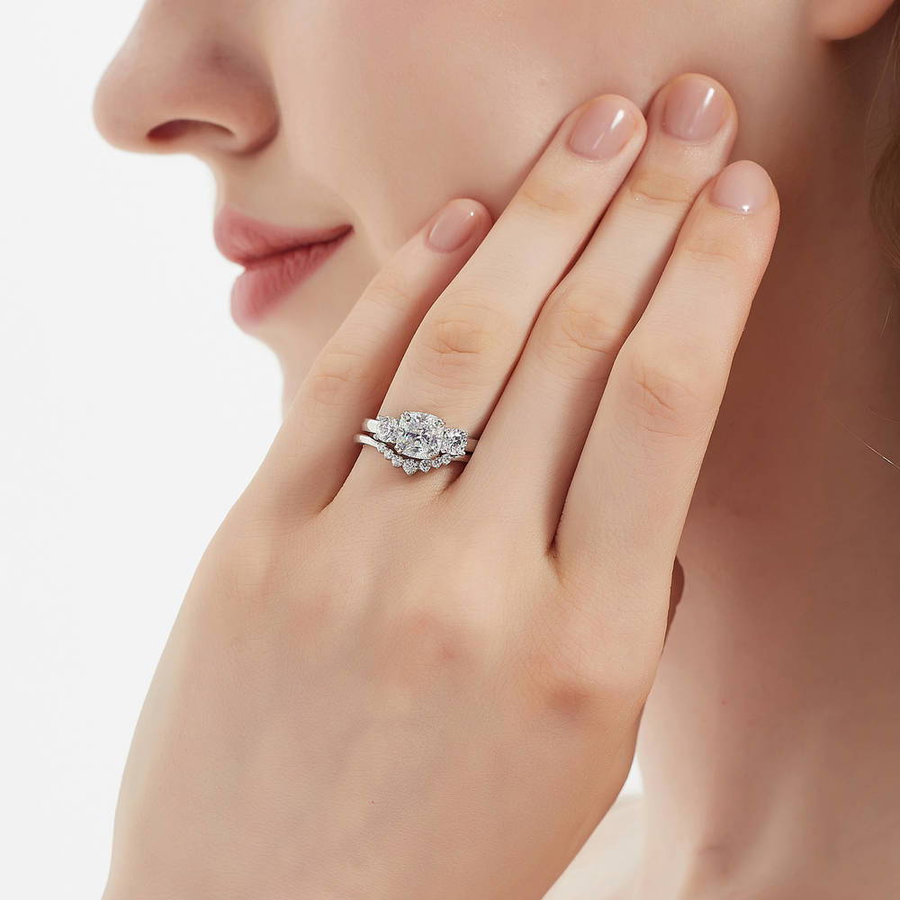 Model wearing 3-Stone Wishbone 7-Stone Cushion CZ Ring Set in Sterling Silver, 6 of 19