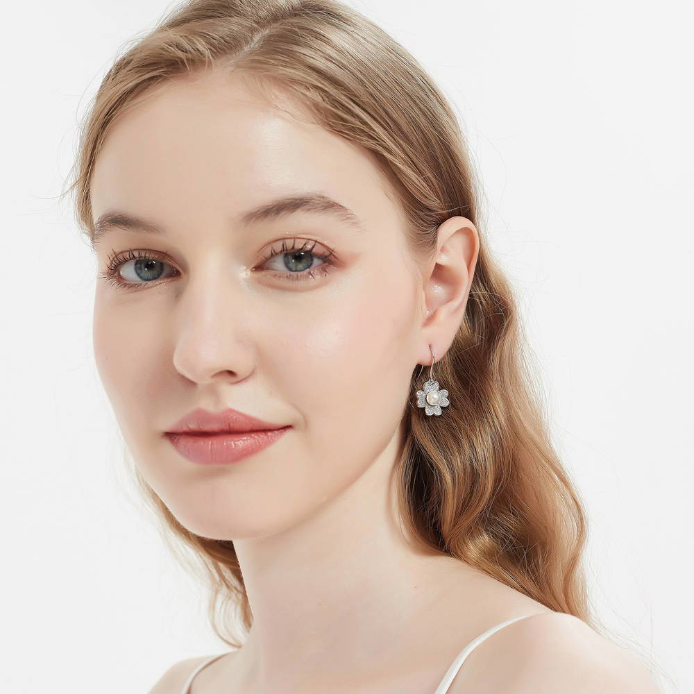 Model wearing Clover Imitation Pearl Fish Hook Earrings in Sterling Silver, 3 of 3