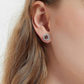 Model wearing Halo Kaleidoscope CZ Stud Earrings in Sterling Silver, Caramel Color