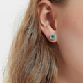 Model wearing Halo Kaleidoscope CZ Stud Earrings in Sterling Silver, Green Color