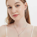 Model wearing Solitaire Asscher CZ Necklace in Sterling Silver 3ct, Yellow Gold Flashed