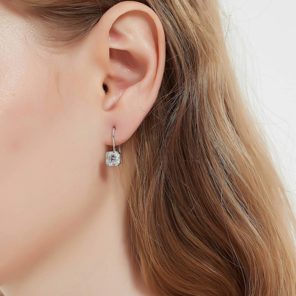 Model wearing Solitaire 3.2ct Asscher CZ Fish Hook Earrings in Sterling Silver, 2 of 8