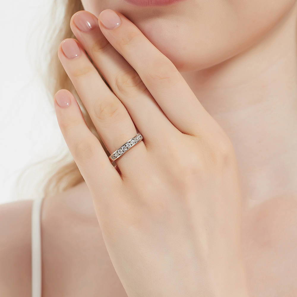 Model wearing Channel Set CZ Curved Half Eternity Ring in Sterling Silver, 3 of 8