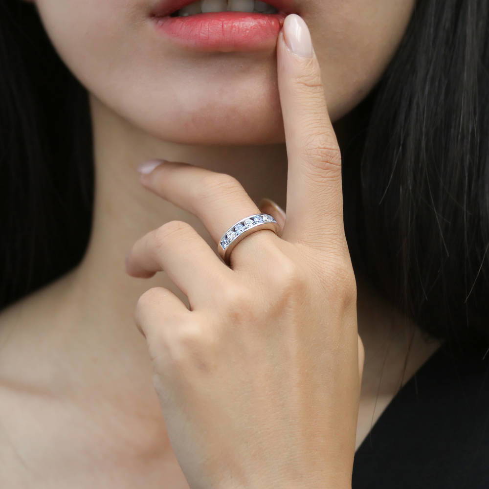 Model wearing Greyish Blue Channel CZ Eternity Ring in Sterling Silver, 2 of 8
