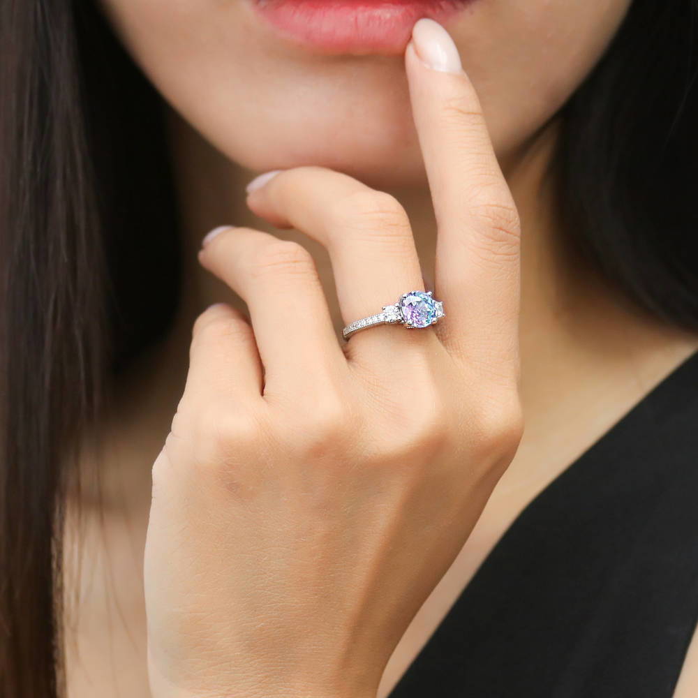Model wearing 3-Stone Kaleidoscope Purple Aqua CZ Ring in Sterling Silver, 2 of 8
