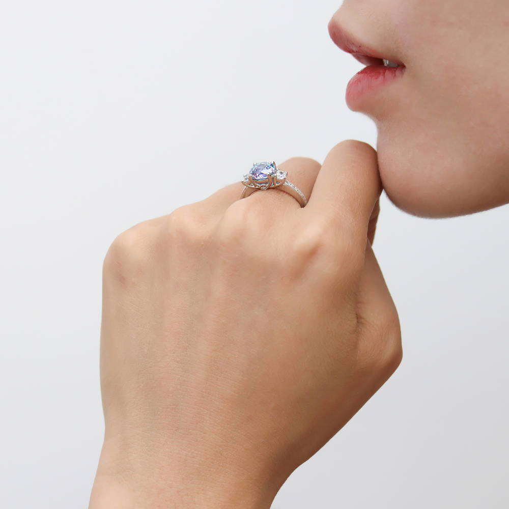 Model wearing 3-Stone Kaleidoscope Purple Aqua CZ Ring in Sterling Silver, 3 of 8