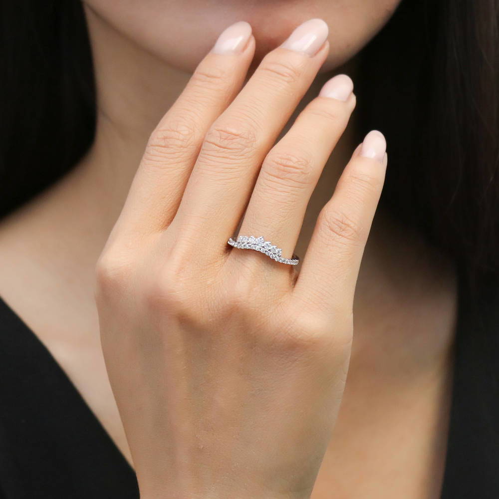 Model wearing Wishbone CZ Curved Half Eternity Ring in Sterling Silver, 2 of 8