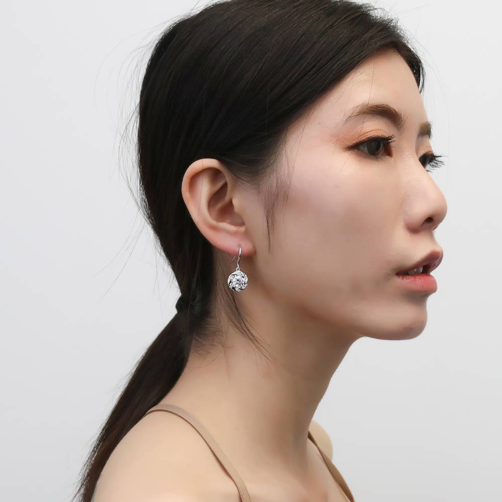 Model wearing Wreath Woven CZ Fish Hook Earrings in Sterling Silver, 2 of 3