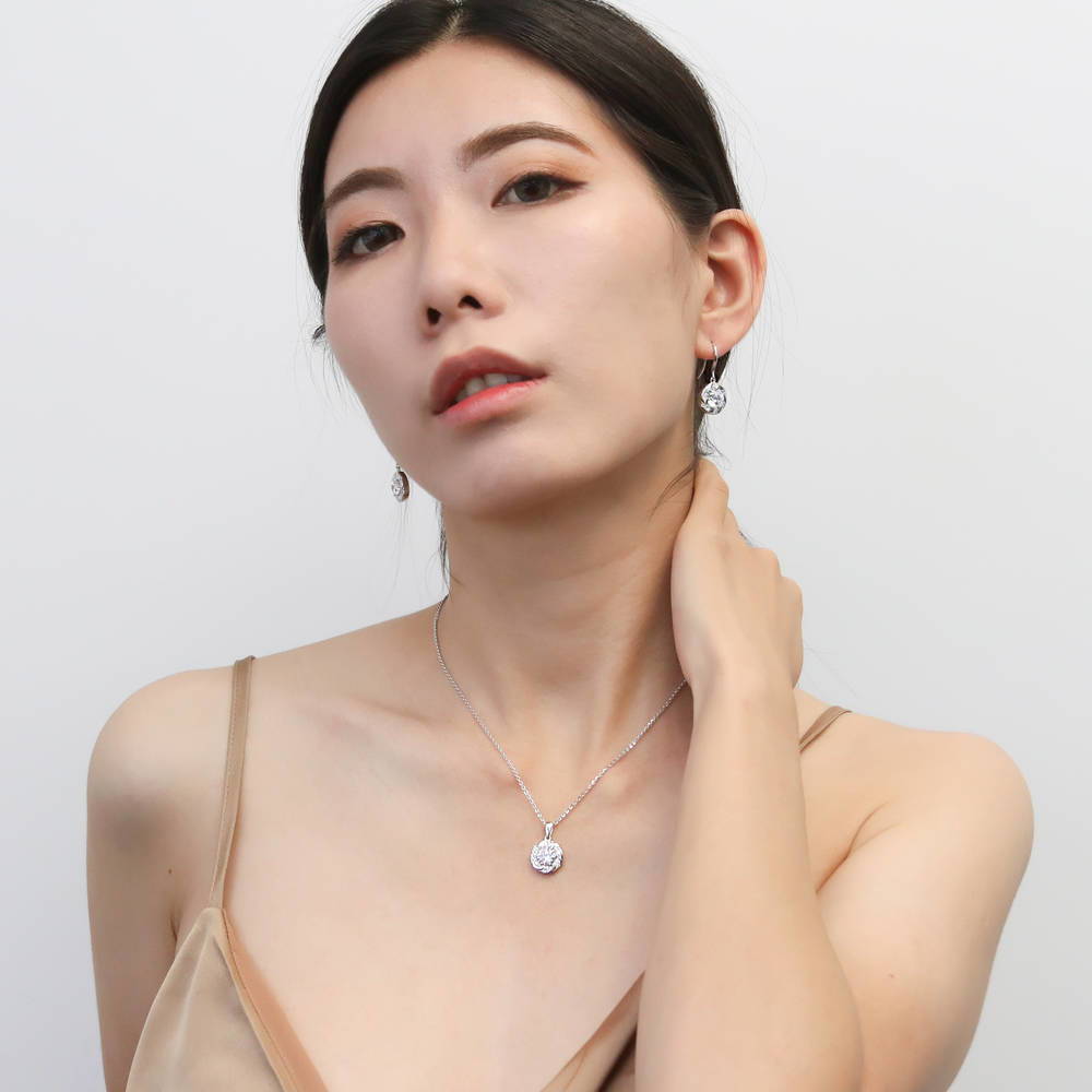Model wearing Wreath Woven CZ Fish Hook Earrings in Sterling Silver, 3 of 3