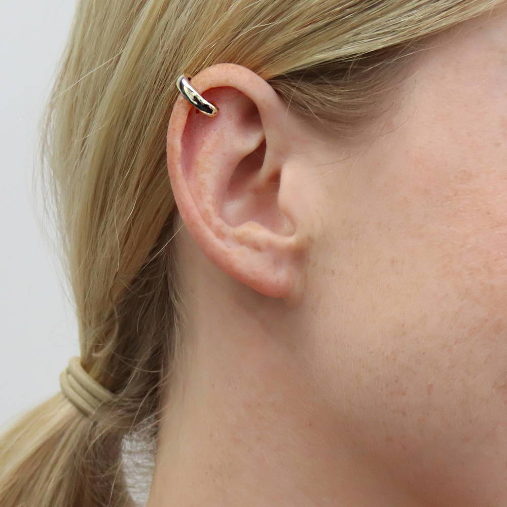 Model wearing Ear Cuff Cartilage Earrings in Sterling Silver, Yellow Gold Flashed