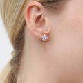 Model wearing Flower CZ Stud Earrings in Sterling Silver, Rose Gold Flashed