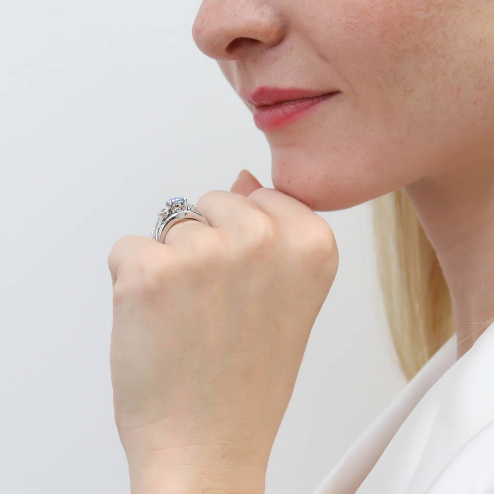 Model wearing 3-Stone Kaleidoscope Purple Aqua CZ Ring in Sterling Silver, 14 of 16