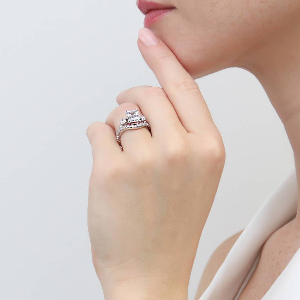 Model wearing 3-Stone Woven 2.6ct Emerald Cut CZ Ring in Sterling Silver, 16 of 19
