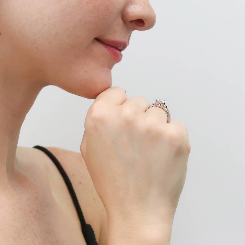 Model wearing 3-Stone 2ct Cushion CZ Ring in Sterling Silver, 6 of 9