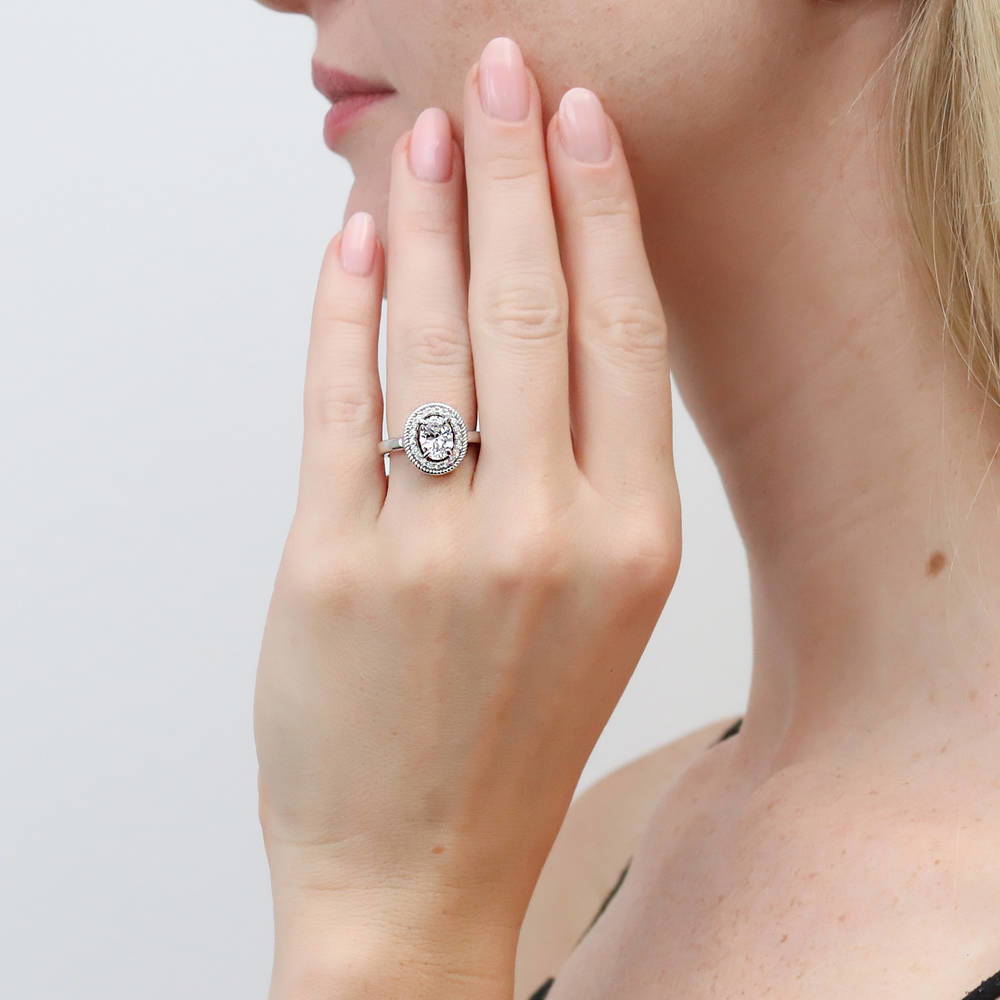 Model wearing Halo Woven Art Deco Oval CZ Ring in Sterling Silver, 2 of 8