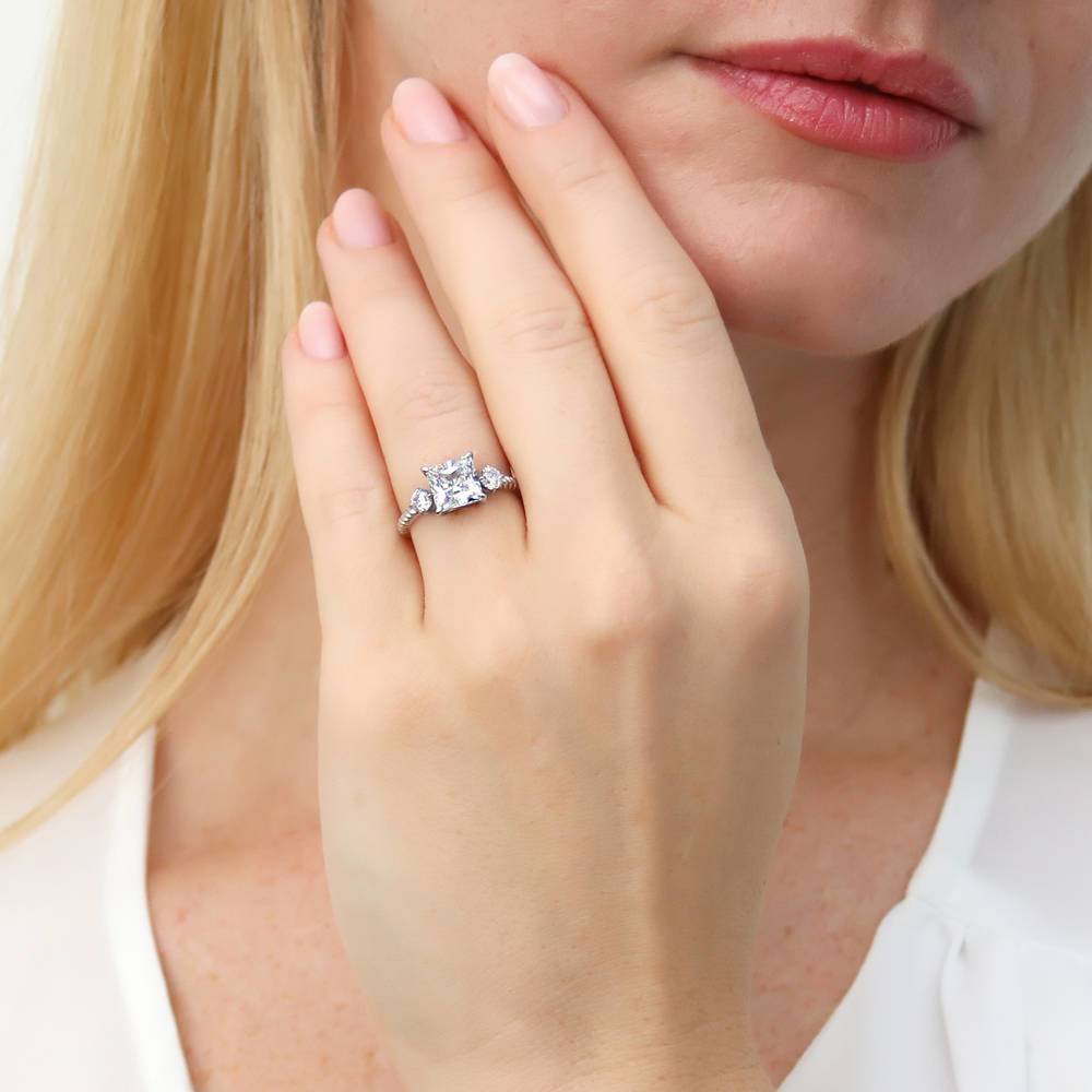 Model wearing 3-Stone Woven 2ct Princess CZ Ring Set in Sterling Silver, 2 of 12