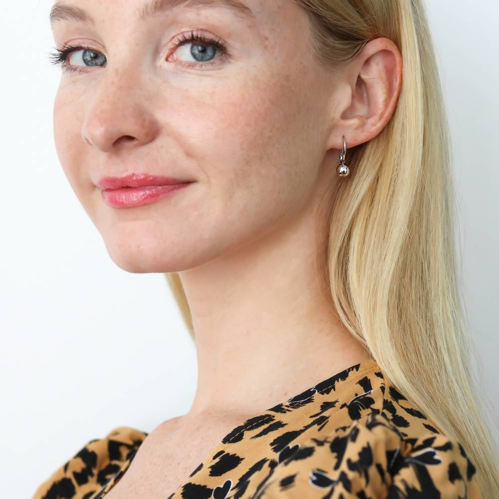 Model wearing Ball Bead Leverback Earrings in Sterling Silver, 2 of 4