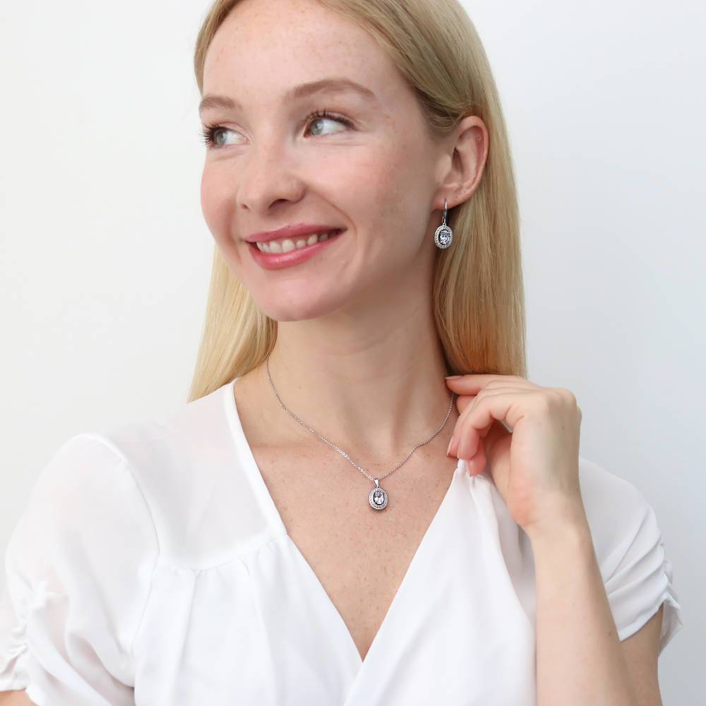 Model wearing Halo Woven Oval CZ Pendant Necklace in Sterling Silver, 5 of 6