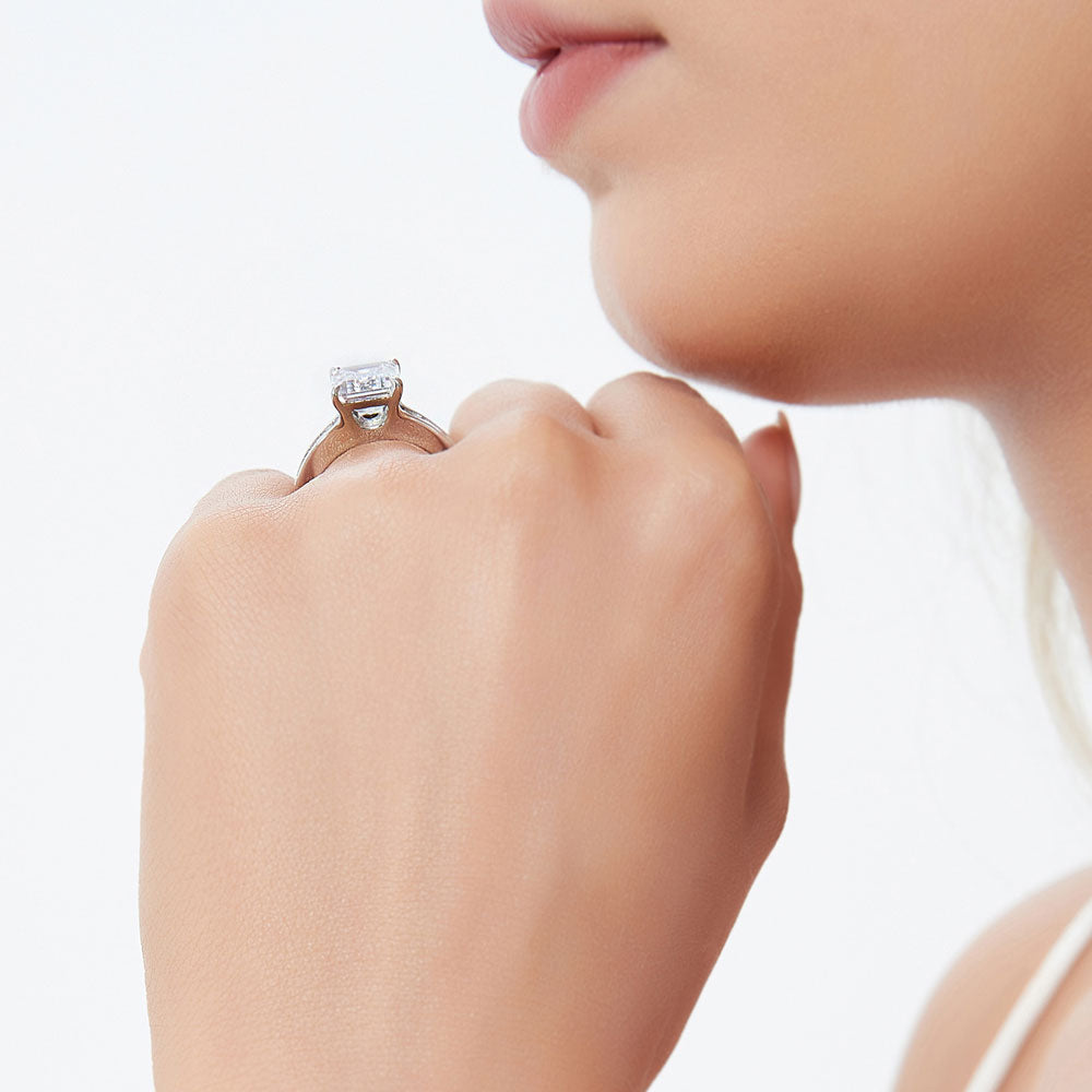 Model wearing Solitaire 3.8ct Emerald Cut CZ Ring Set in Sterling Silver, 13 of 17