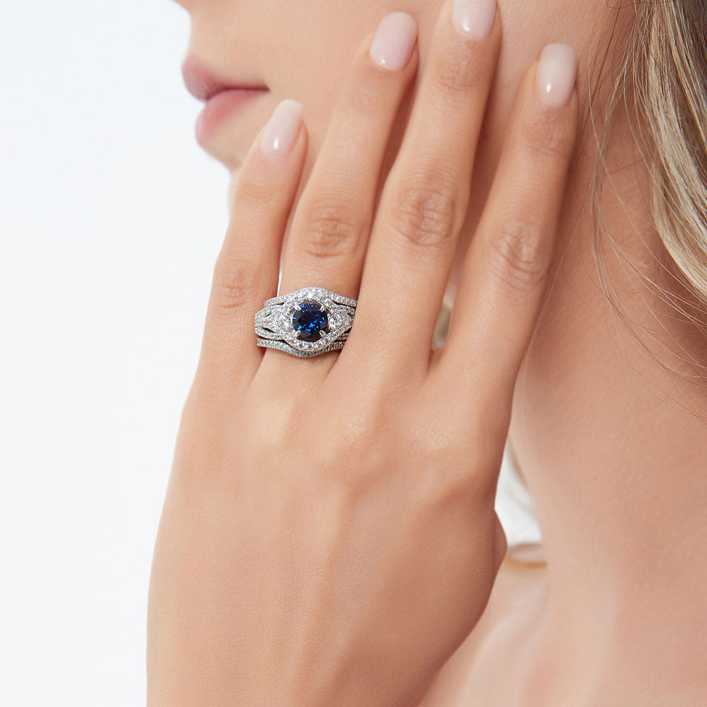Model wearing 3-Stone Simulated Blue Sapphire Round CZ Ring Set in Sterling Silver, 5 of 16
