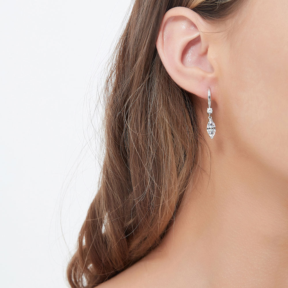 Model wearing Solitaire 2ct Marquise CZ Leverback Earrings in Sterling Silver, 2 of 5