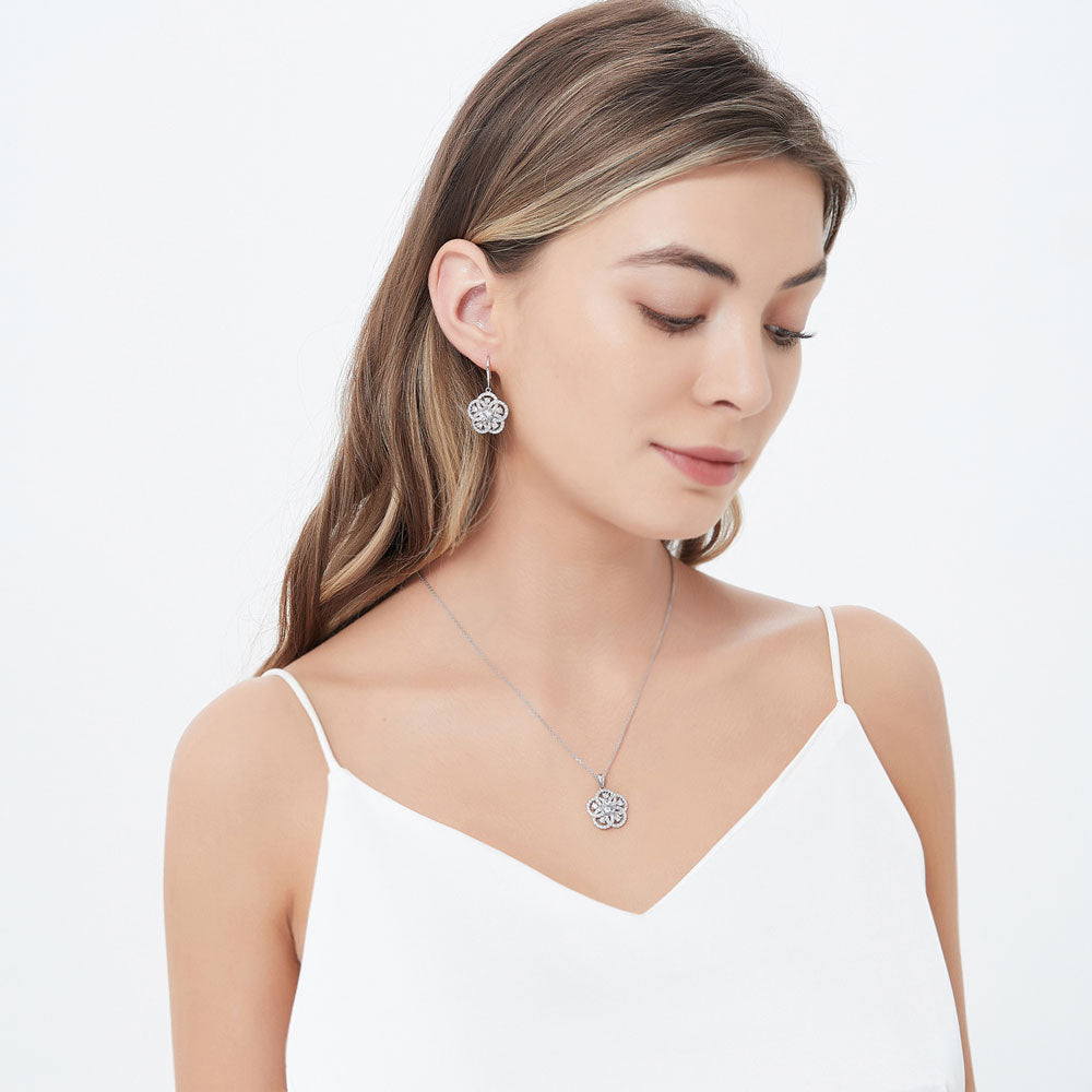 Model wearing Flower CZ Pendant Necklace in Sterling Silver, 3 of 6