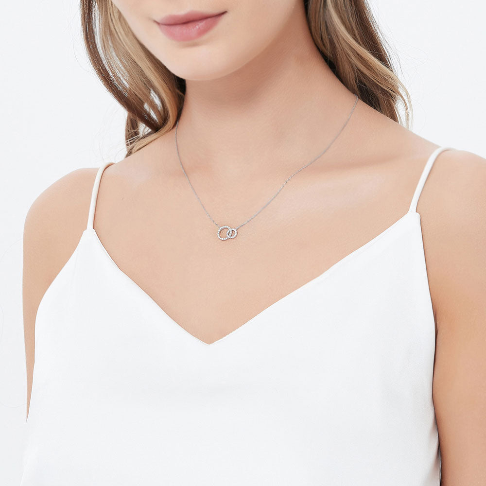 Model wearing Open Circle Interlocking CZ Necklace in Sterling Silver, 3 of 7