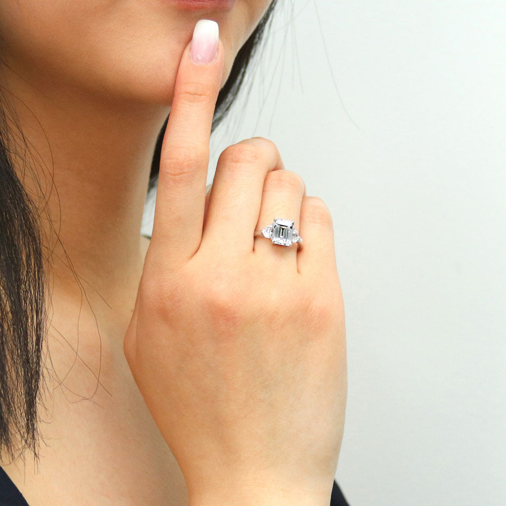 Model wearing 3-Stone 2.6ct Emerald Cut CZ Ring in Sterling Silver, 5 of 9