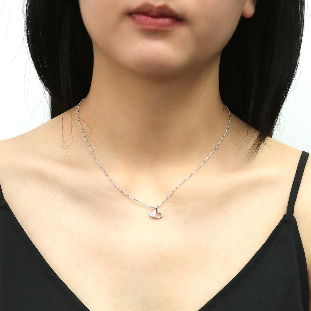Model wearing Open Heart CZ Necklace in Sterling Silver, 2 of 5