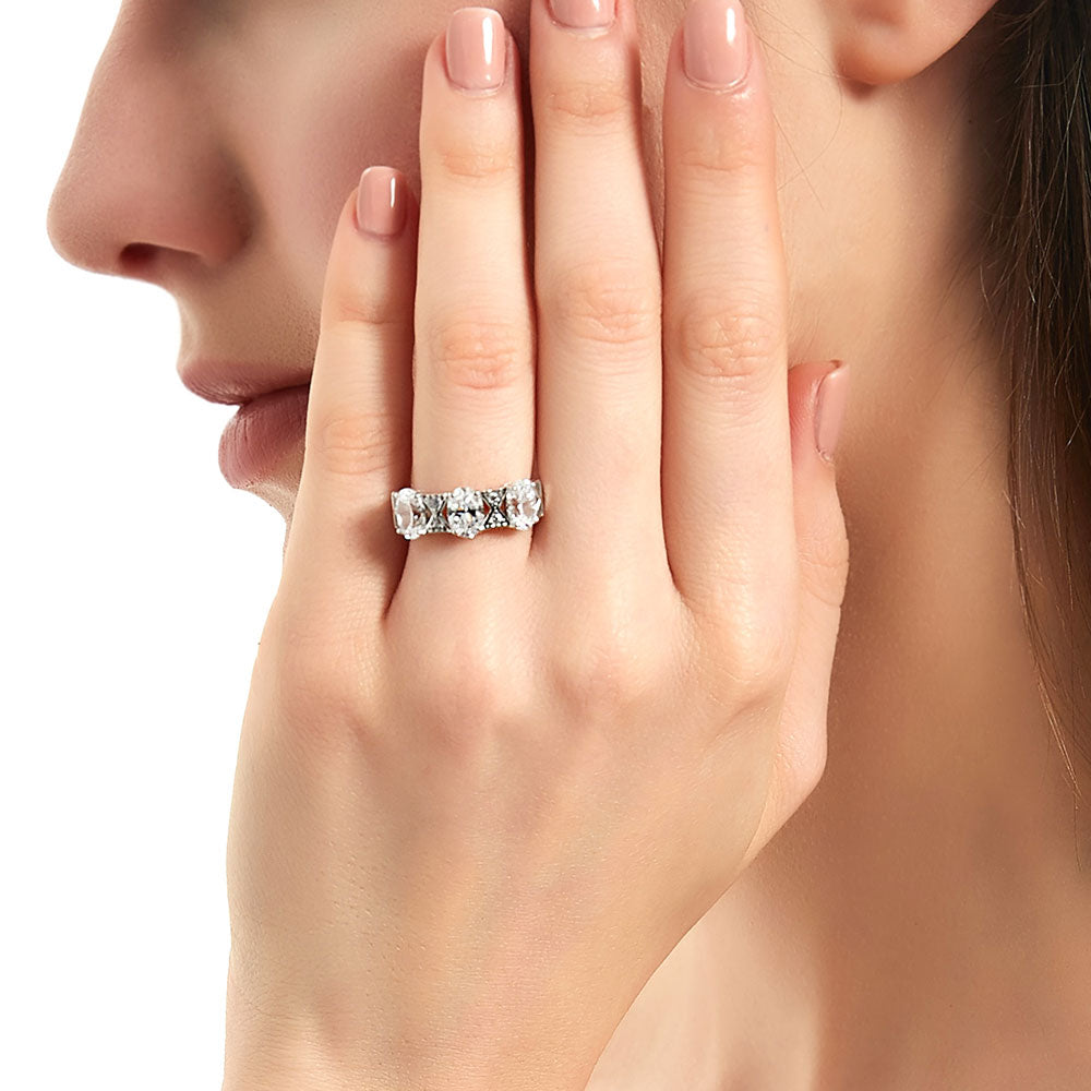 Model wearing 3-Stone Art Deco 2.1ct Oval CZ Ring in Sterling Silver, 3 of 11
