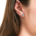 Model wearing Halo CZ Stud Earrings in Sterling Silver, Rose Gold Flashed