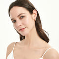 Model wearing Checkerboard CZ Medium Hoop Earrings in Sterling Silver 0.6 inch, Yellow Gold Flashed