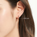 Model wearing Solitaire CZ Small Hoop Earrings in Gold Flashed Sterling Silver, 0.55 inch