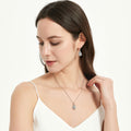 Model wearing Heart Flower CZ Necklace in Sterling Silver, Clear Color