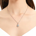 Model wearing Heart Flower CZ Necklace in Sterling Silver, Clear Color