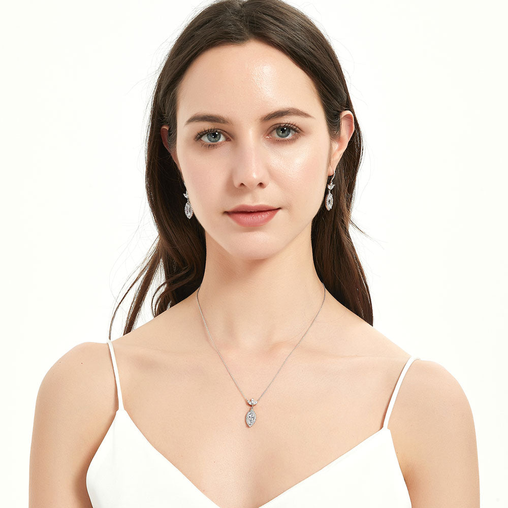 Model wearing Halo Flower Marquise CZ Necklace in Sterling Silver, 3 of 5