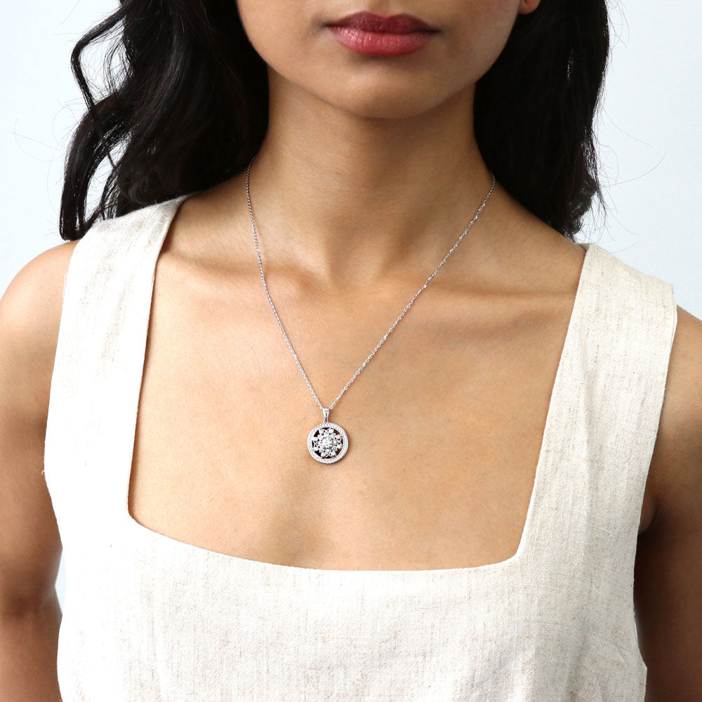 Model wearing Flower Medallion Filigree CZ Necklace in Sterling Silver, 2 of 8