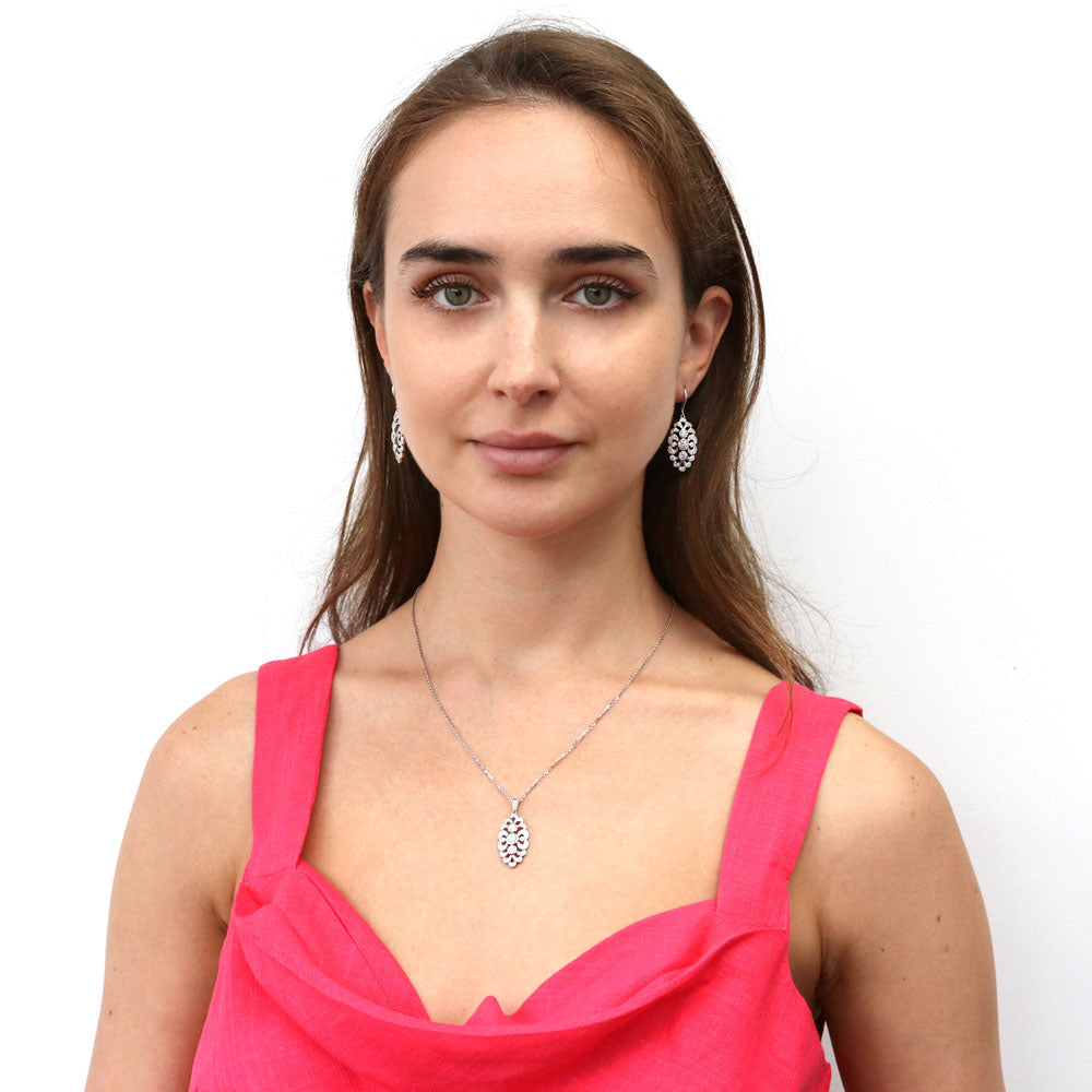Model wearing Navette Art Deco CZ Fish Hook Earrings in Sterling Silver, 3 of 6